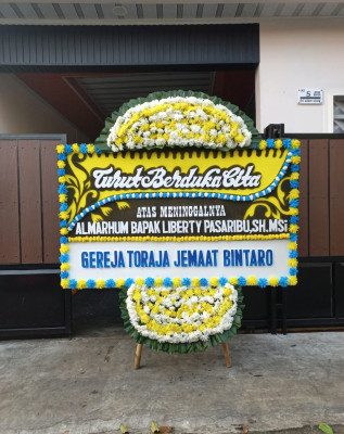 Papan Bunga Duka di Bukit Wolio Indah